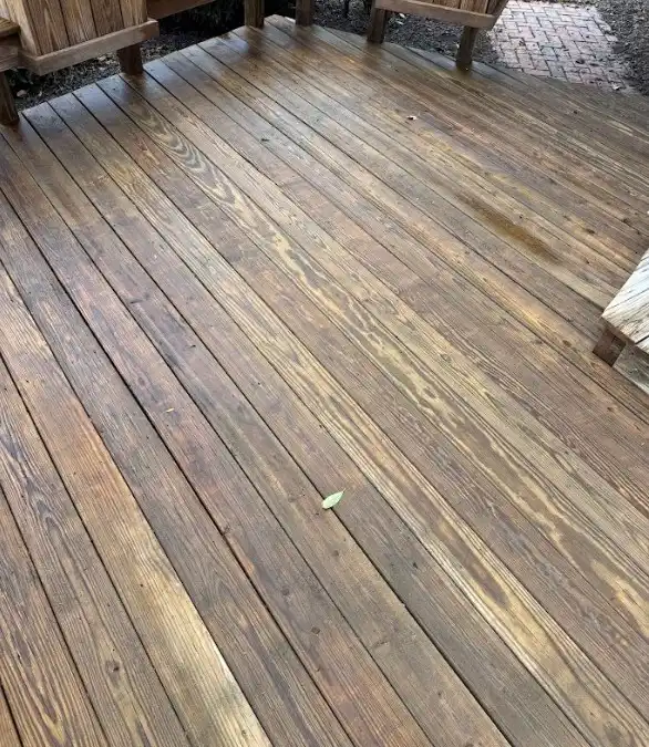 After deck cleaning: the same wood deck with its warm natural grain showing again