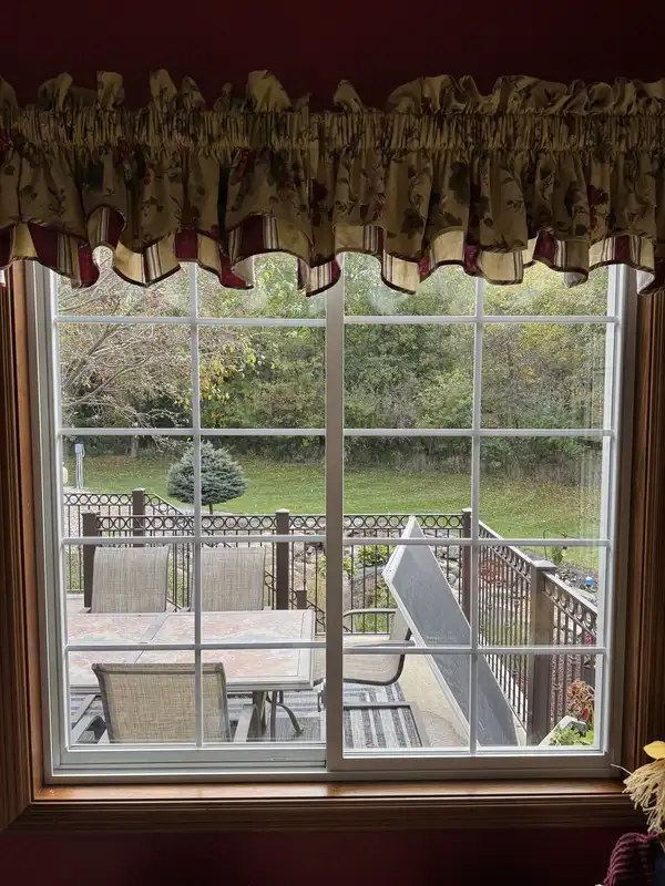 The same Roanoke sliding glass door after cleaning, view of the deck now clear
